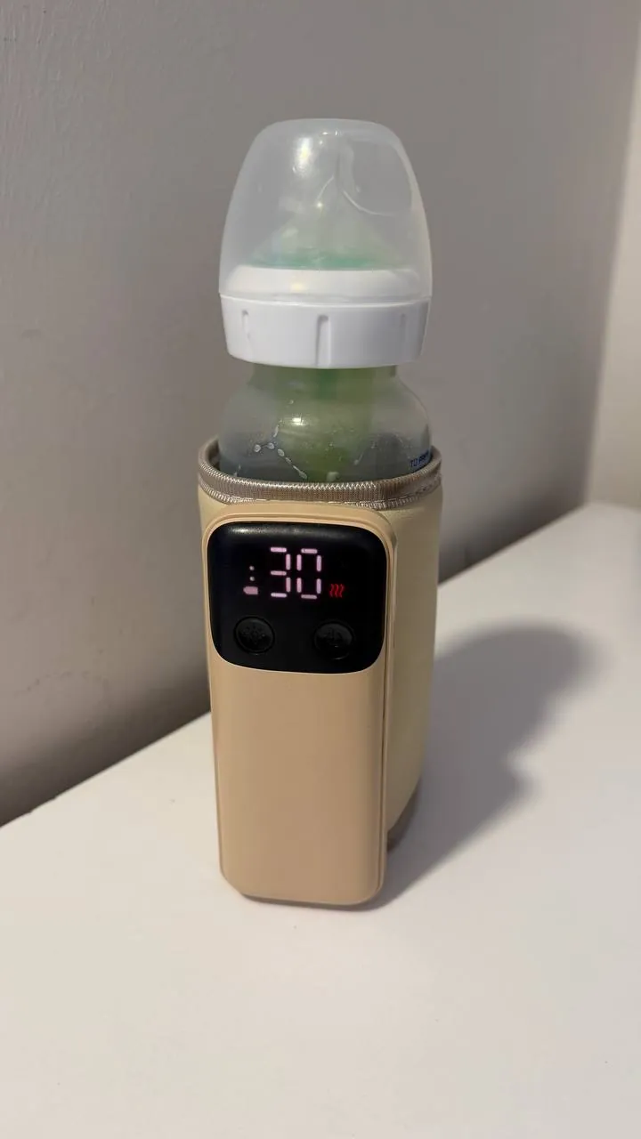 Умный подогреватель для бутылочек с аккумулятором 8000 mAh в идеальном состоянии.